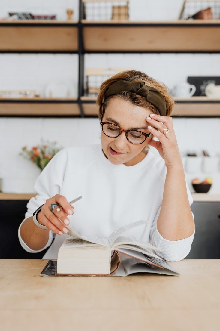 A woman studying a dictionary