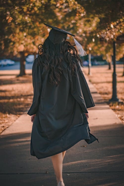 A university student in a graduation cap and gown